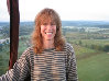 this girl is with her mom for a air balloon flight
